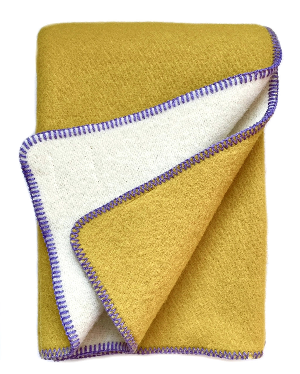 Reversible Norwegian merino wool plaid blanket in spicy mustard tone, soft brushed texture, jacquard weave, artisanal home textile.