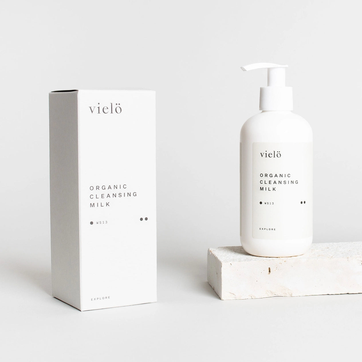 Organic cleansing milk by Vielö, creamy gentle texture, minimalist bottle design, chamomile, arnica and sage botanicals, daily makeup remover ritual.