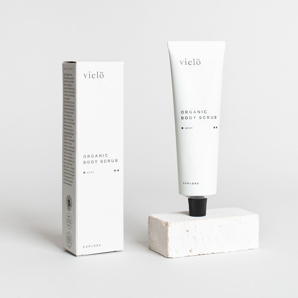 Gentle organic body exfoliating scrub, natural apricot kernel texture, sulfate-free botanical skincare blend, calming lavender and rosemary plant essence, minimalist travel-size bodycare essential.