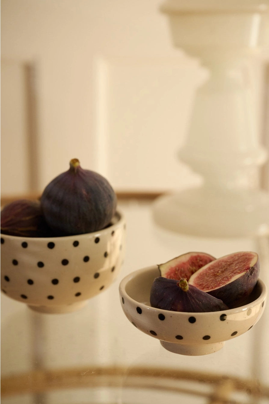 Hand-glazed ceramic bowl by Moshi Moshi, signature dotted glazing in minimalist dotted pattern, matte ceramic texture, unique artisanal interior piece. Dimensions: bowl 10.5 × 6.5 cm, lid 9.2 × 3.8 cm, modern chic home aesthetic, dishwasher-safe design.